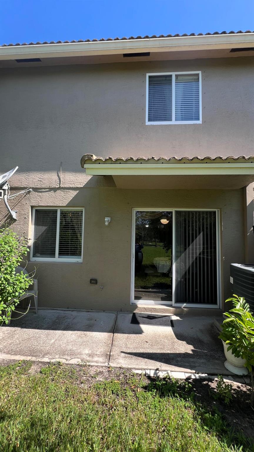 Beautiful 2-Bedroom Townhouse in Gated Community. Spacious 2-bedroom, 2.5-bath townhouse featuring tile and wood laminate flooring throughout. The first floor offers a convenient half bath, while the second floor includes two bedrooms, two full bathrooms, and a laundry room. The master suite with walk-in closet and a private bathroom with dual sinks. Located in a secure gated community with 24-hour security guard, residents also have access to club house, swimming pools, gym, tennis courts, and basketball courts. Conveniently close to I-95, shopping, and dining.