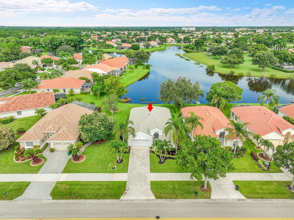 Photo of 566 SW Lake Charles Circle, Port Saint Lucie, FL 34986 (MLS # R11110127)