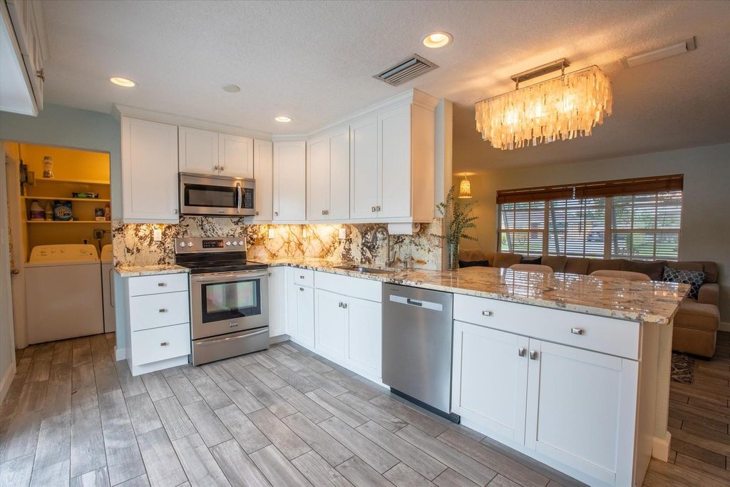 Photo of 4359 Empress Street, Palm Beach Gardens, FL 33410 (MLS # R11033045)