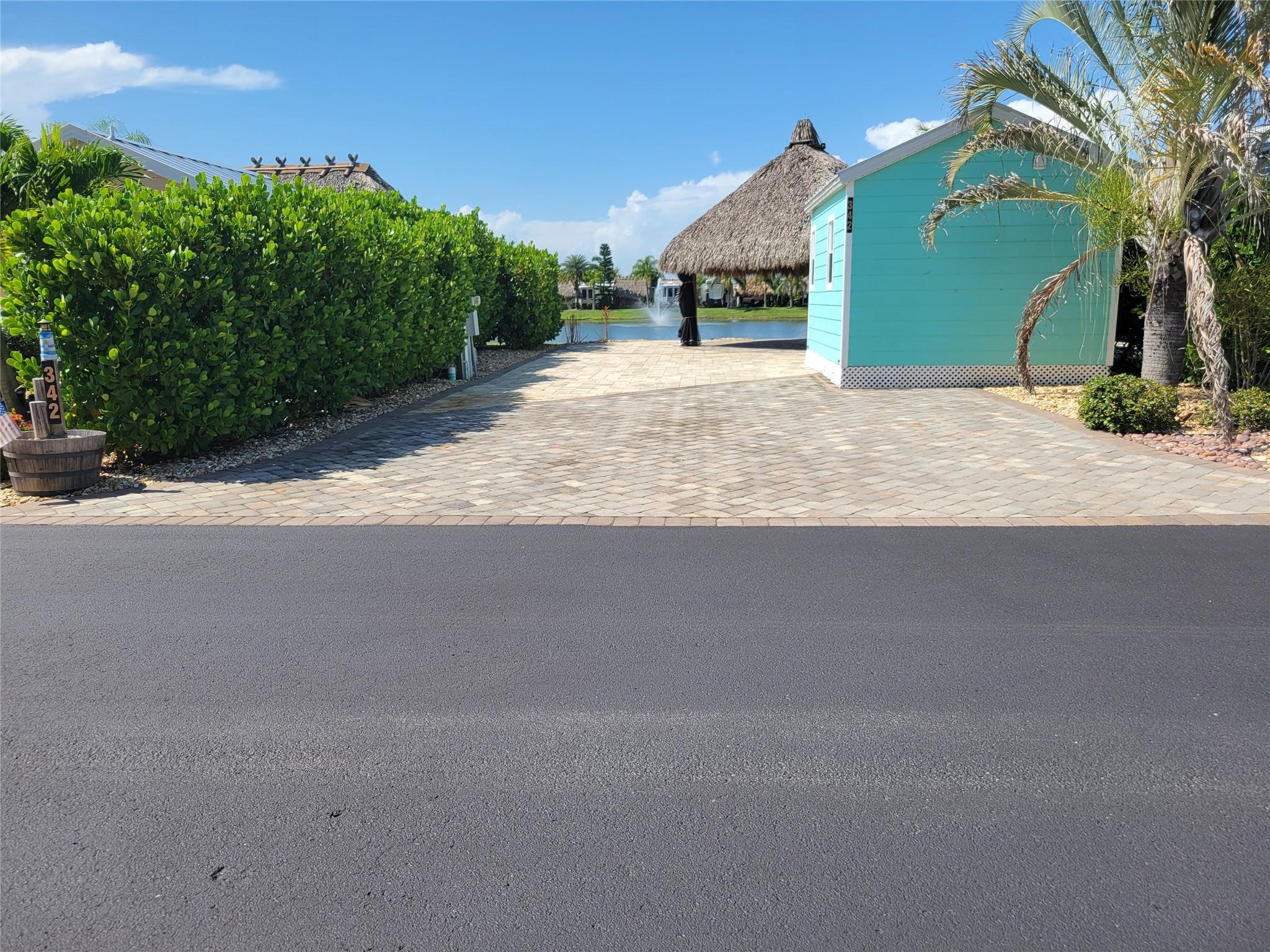 Amazing lakefront lot located in Silver Palms Rv Resort, a 5 star gated community 1/4 mile from Lake Okeechobee. Lot features a unique custom designed octagon tiki with roll down shades overlooking the lake and fountains. 12X14 casita with 1/2 bath, ac, washer/dryer ,fridge ,queen size murphy bed, pantry and kitchen countertop. Retractable awning from casita provides additional shade for outdoor cooking.
Excellent opportunity for year round or seasonal use. Lot can be rented when not being used. Daily activities, clubhouse, card, billiard, library and fitness center Poolside cafe with live music. and so much more awaits you at this well maintained and active community. Escape the cold every year and see why Silver Palms is the place to be.