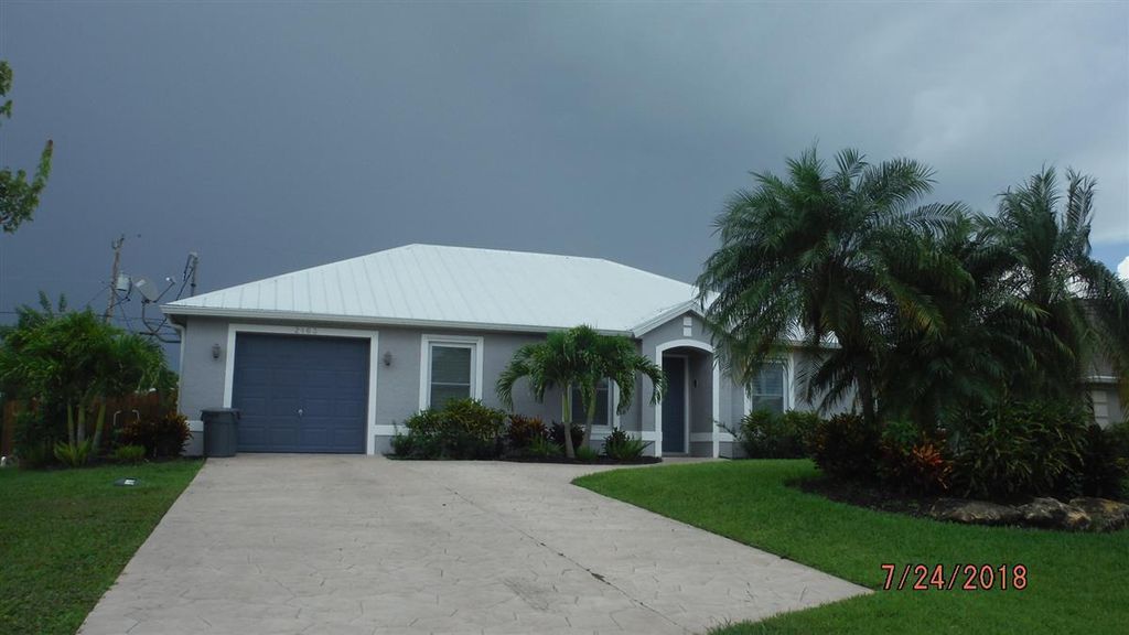 Photo of 2163 SW Algiers Street, Port Saint Lucie, FL 34953 (MLS # R11090855)