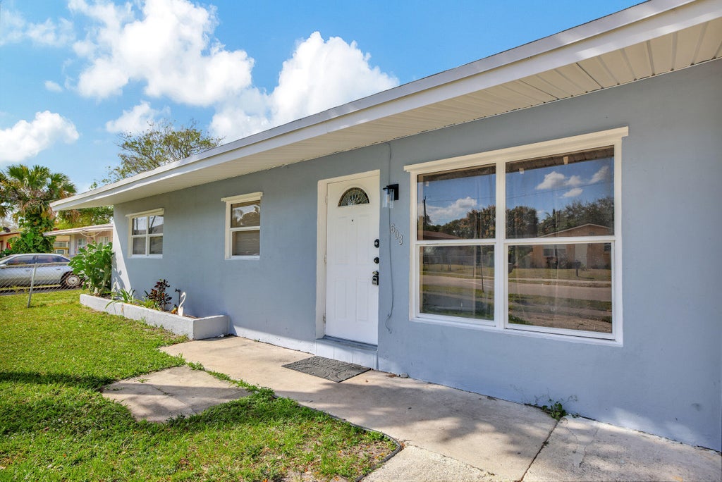 Photo of 603 NW 2nd Avenue, Deerfield Beach, FL 33441 (MLS # R10961205)
