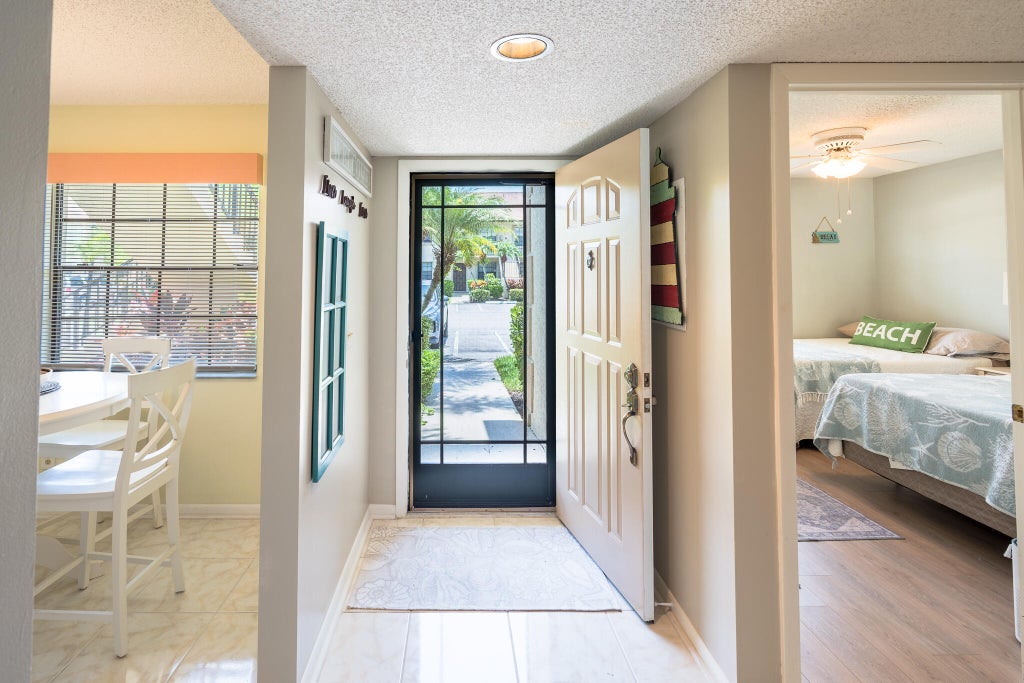 Photo of 1401 PINECREST Circle #A, Jupiter, FL 33458 (MLS # B26052359)