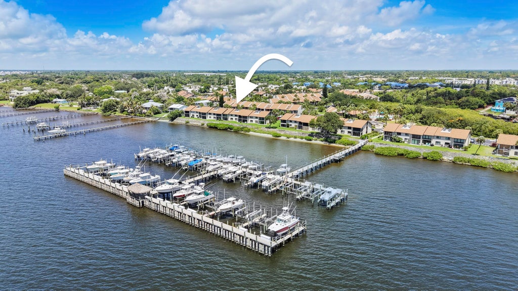 Photo of 1600 NE Dixie Highway #4-107, Jensen Beach, FL 34957 (MLS # B26063590)