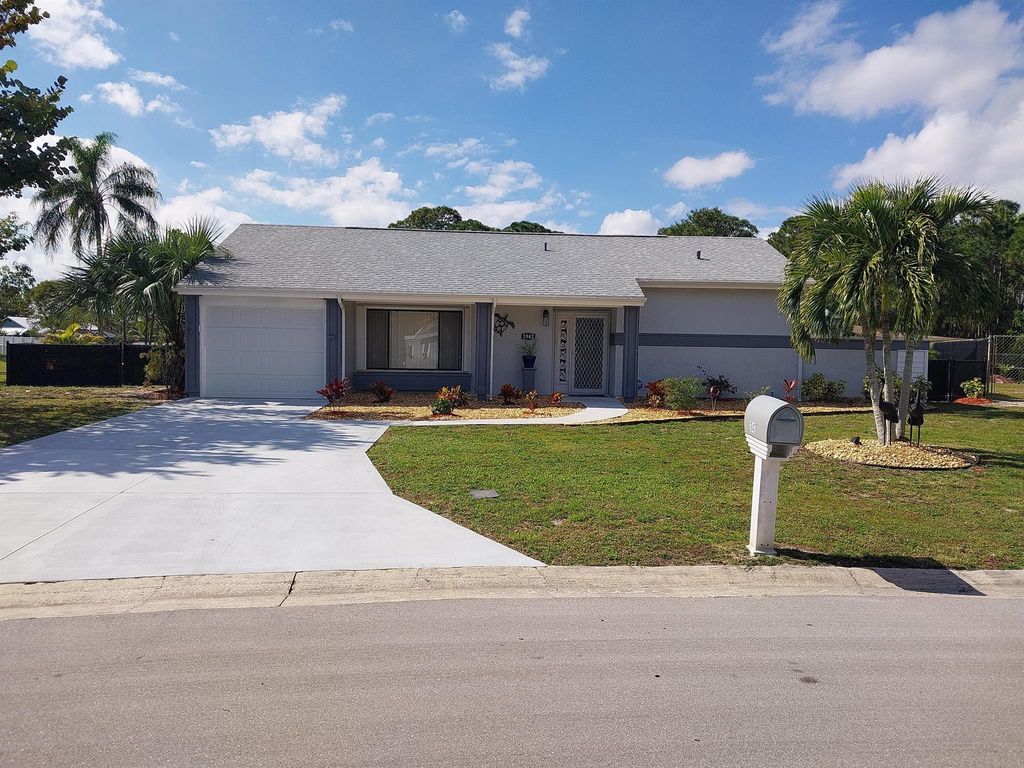 Photo of 1942 SE Burgundy Lane, Port Saint Lucie, FL 34952 (MLS # R11052838)