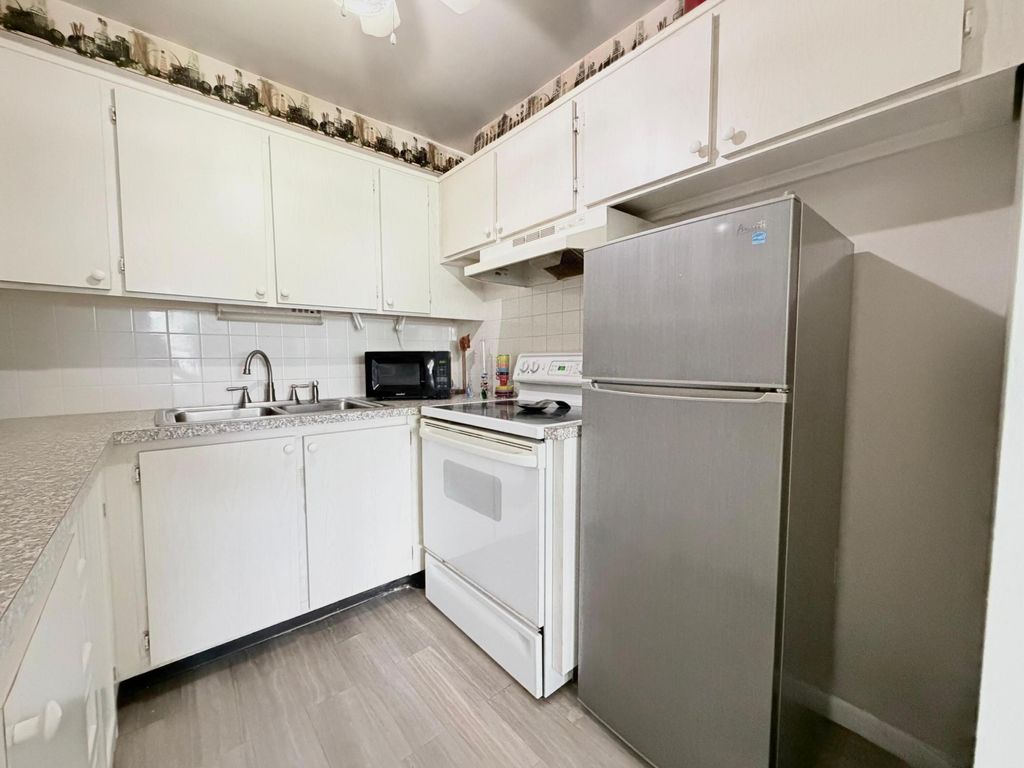 Photo of 62 Easthampton C, West Palm Beach, FL 33417 (MLS # B26013665)