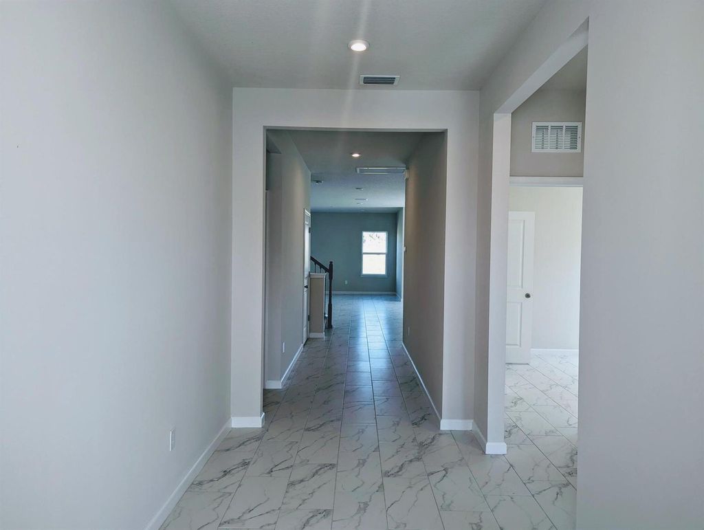 Photo of 10579 SW Vasari Way SW, Port Saint Lucie, FL 34987 (MLS # R10980804)