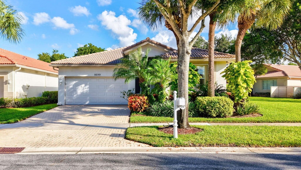 Photo of 9299 Sapphire Cove Drive, West Palm Beach, FL 33411 (MLS # B26089688)