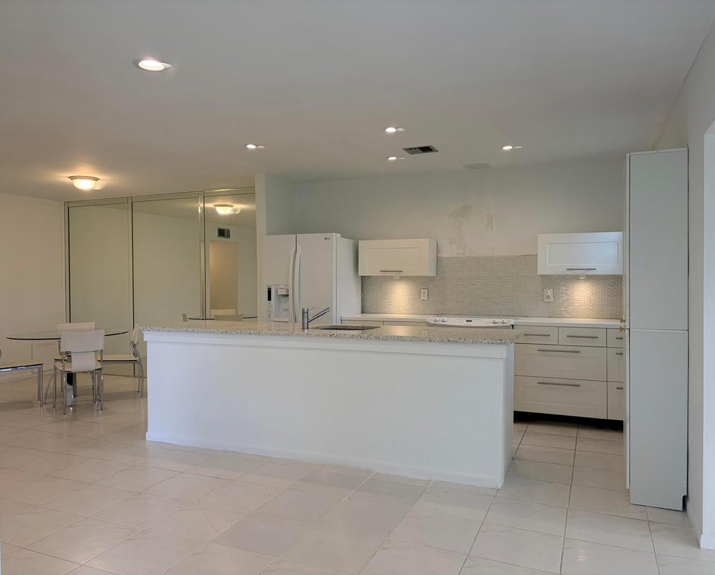 Photo of 14492 Canalview Drive #B, Delray Beach, FL 33484 (MLS # B26089732)