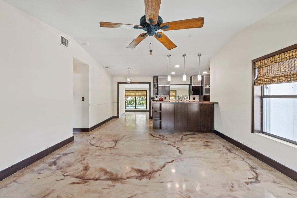 Photo of 523 Riverside Drive, Palm Beach Gardens, FL 33410 (MLS # R10975038)