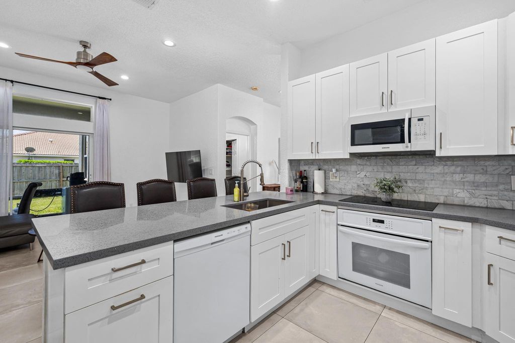 Photo of 1834 Capeside Circle, Wellington, FL 33414 (MLS # F10556025)