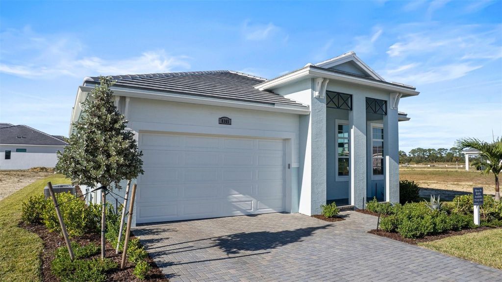 Photo of 8365 SW Piacenza Way, Port Saint Lucie, FL 34987 (MLS # F10539357)