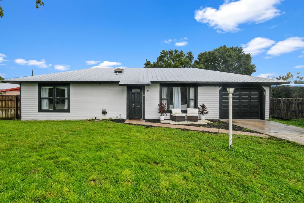 Photo of 7105 Pensacola Road, Fort Pierce, FL 34951 (MLS # R11023330)