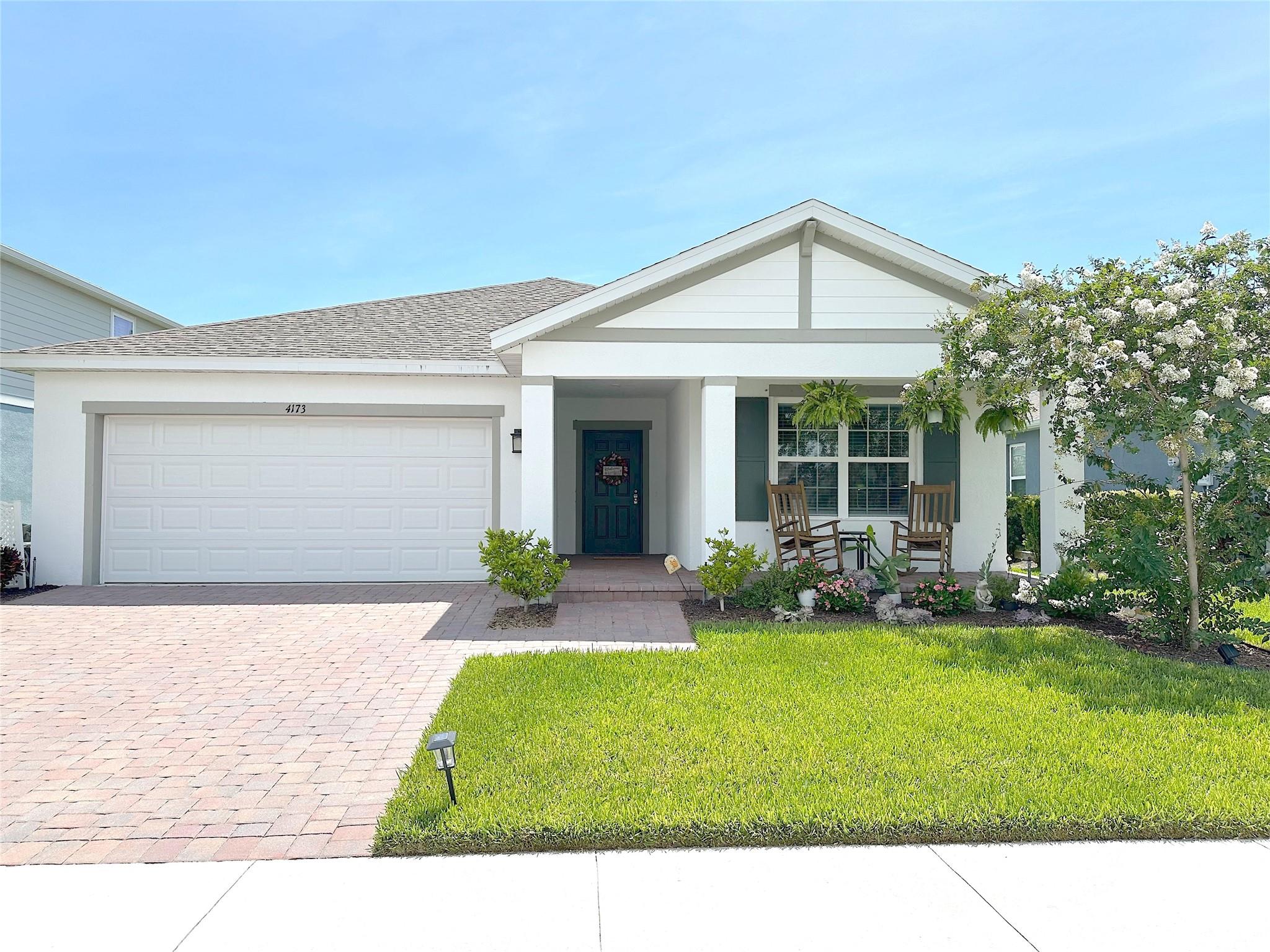 Single family home in Lost Tree of Vero Beach. Gated community. Southern "charm" with covered front porch to relax and enjoy morning coffee or evening sunsets! Open floor plan, island in kitchen, SS appliances, white cabinets. Master suite is private, oversized walk in closets, double sinks on vanity, walk in shower. Tile flooring throughout! Preserve view. Community clubhouse, pool, tennis/pickle ball courts and more! Close to shopping, short distance to medical facilities.