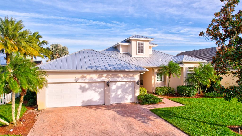 Photo of 184 NW Magnolia Lakes Boulevard, Port Saint Lucie, FL 34986 (MLS # R10951993)