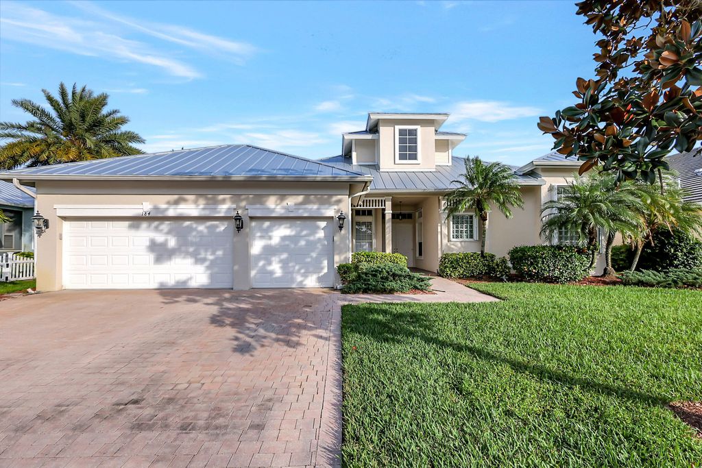 Photo of 184 NW Magnolia Lakes Boulevard, Port Saint Lucie, FL 34986 (MLS # R10951993)