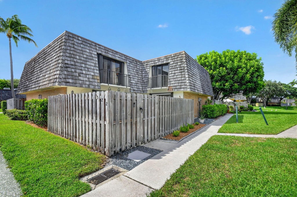 Photo of 322 Lake Arbor Drive, Palm Springs, FL 33461 (MLS # B26076579)