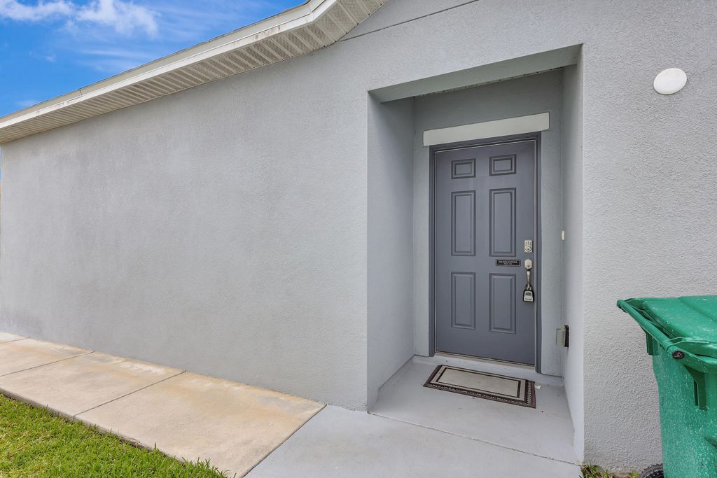 Photo of 10853 SW Vasari Way, Port Saint Lucie, FL 34987 (MLS # B26015039)