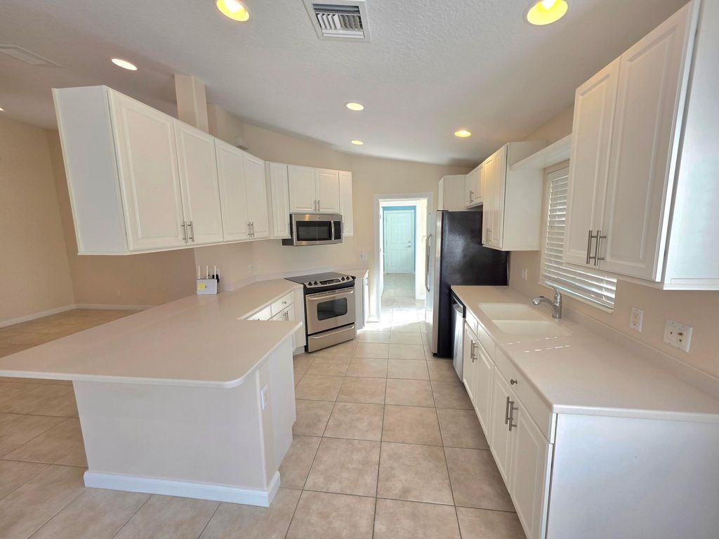 Photo of 10399 SW Stratton Drive, Port Saint Lucie, FL 34987 (MLS # R11161835)