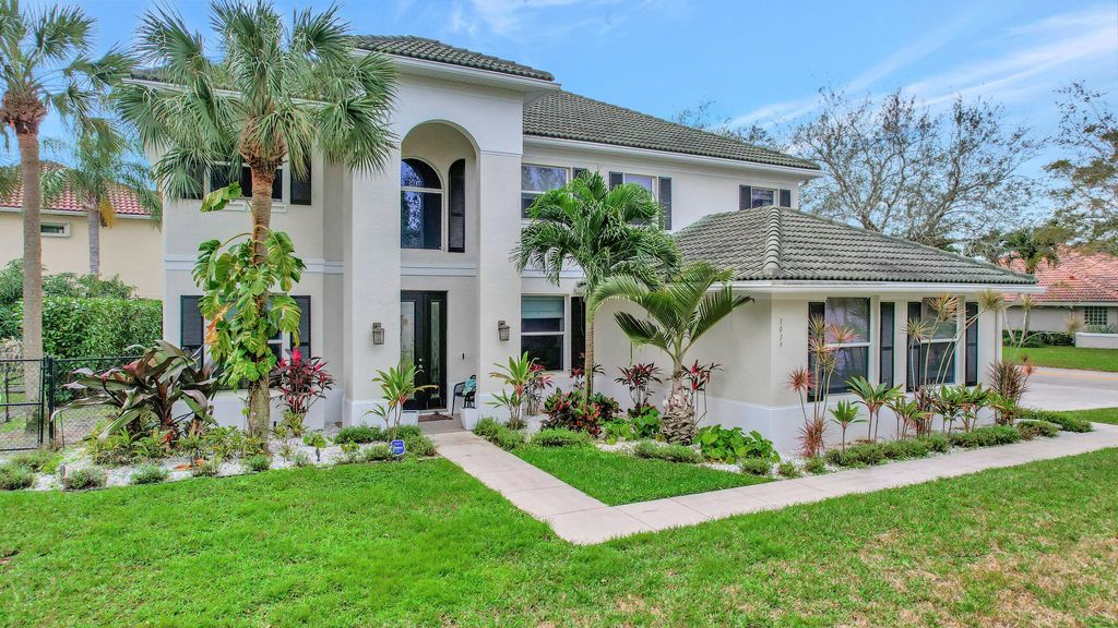 Photo of 1039 Egret Circle N, Jupiter, FL 33458 (MLS # R10957844)