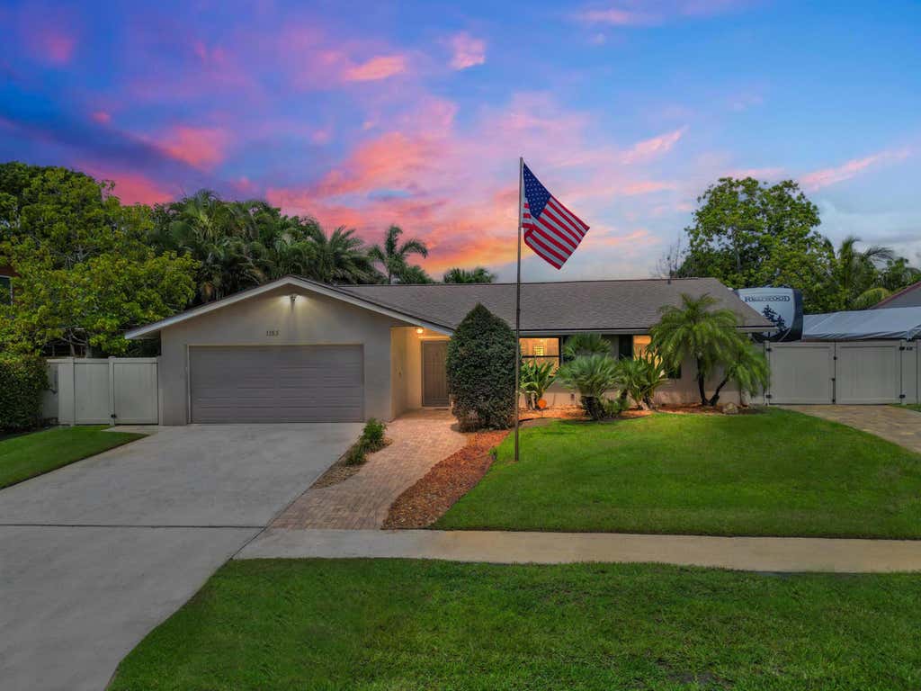 Photo of 1155 Woodcrest Road W, West Palm Beach, FL 33417 (MLS # R11101665)