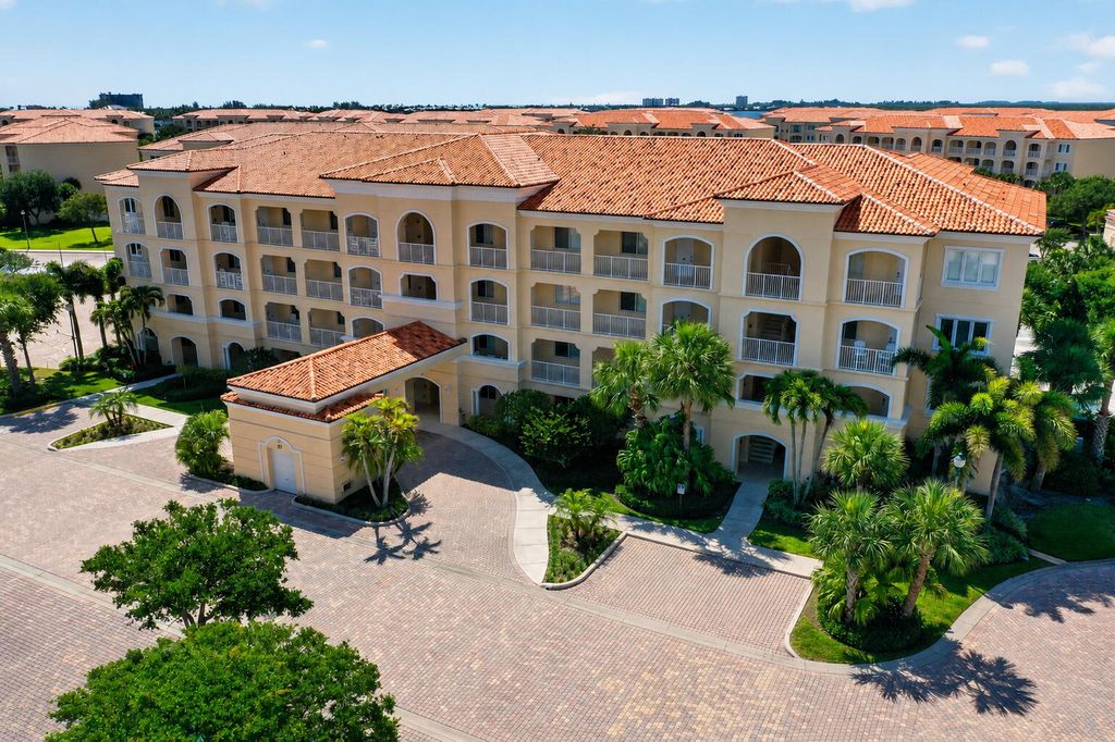 Photo of 37 E Harbour Isle Dr Drive E #106, Fort Pierce, FL 34949 (MLS # B26029669)