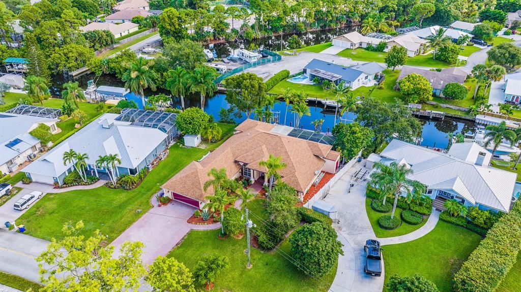 Photo of 1289 SW Pine Tree Lane, Palm City, FL 34990 (MLS # R10827933)