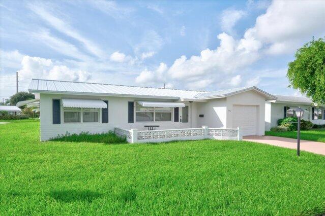 Photo of 1590 SW 13TH Terrace, Boynton Beach, FL 33426 (MLS # B26076765)