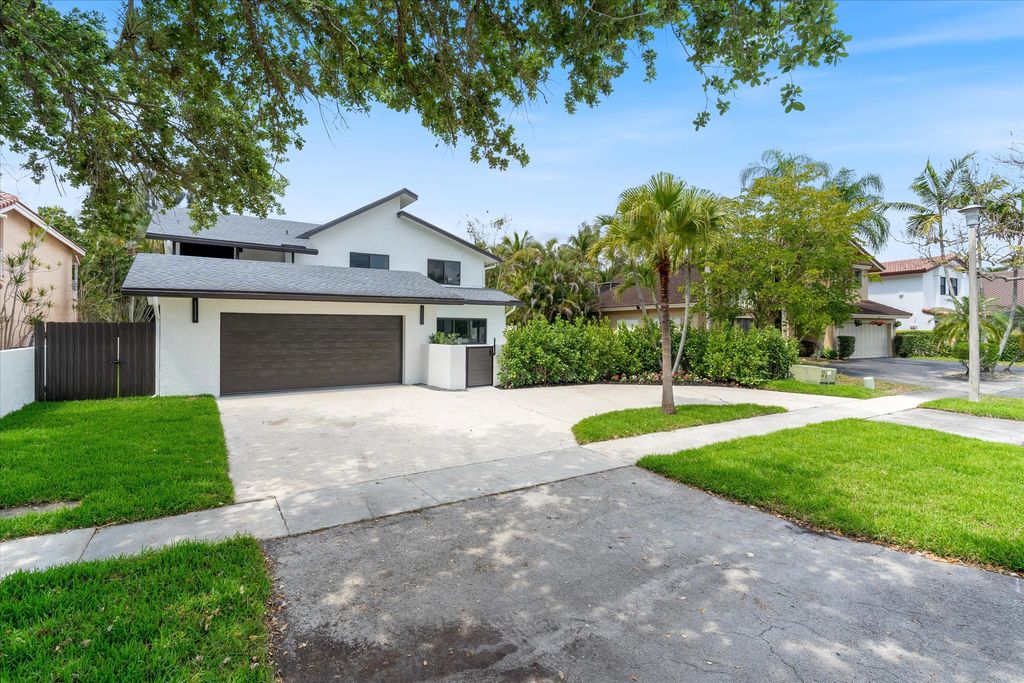 Photo of 911 Mockingbird Lane, Plantation, FL 33324 (MLS # B26007505)