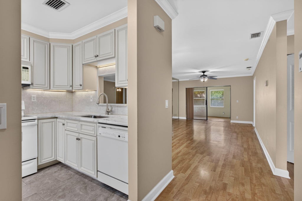 Photo of 353 NW 36th Avenue, Deerfield Beach, FL 33442 (MLS # B26042694)