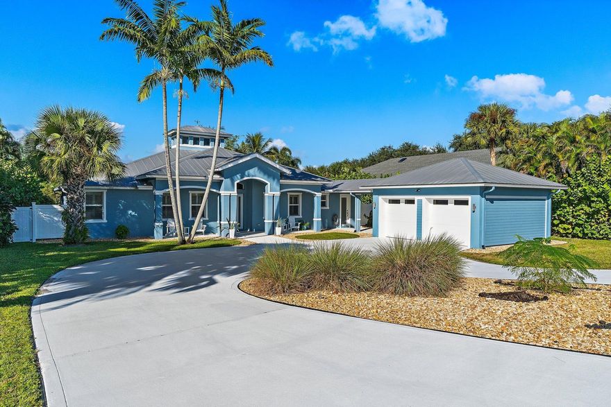 Beautiful updated custom-built pool home in the exclusive Papaya Estates of Hobe Hills. Positioned on no-thru street across from Jonathan Dickinson SP, this 4-bedroom plus den, 3-bathroom home sits on 1/2-acre, non-HOA lot and blends privacy and coastal charm only 1.6 miles from beach, dining, and shopping.Designed for elegant comfort and functionality, this open-concept CBS home has impact windows & doors, split floor plan with private MBR suite, volume ceilings with large cupola, pocketing sliding doors opening to an extra-large covered lanai, perfect for entertaining.  Ideal for discerning buyers seeking a unique blend of luxury, space, and proximity to nature. This home is a rare find. Experience Florida living at its best!