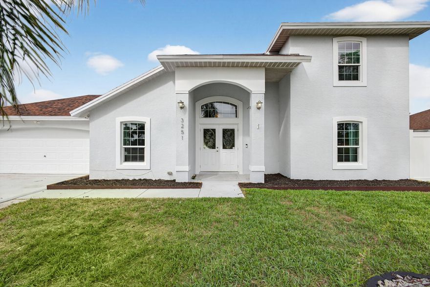 2 STORY POOL HOME, FULLY REMODELED quartz counters in the spacious kitchen and more! HUGE PRIVATE MASTER SUITE WITH ITS OWN DECK ON THE 2nd FLOOR! spacious closets, Over sized garage plenty of storage through out, Beautiful fenced in backyard, plenty of privacy to enjoy the pool plus its all screened in. New roof 2025, Newer AC, impact windows 2019, pool refinished, new landscaping, bathrooms and kitchen updated 2019. And not only is this home located directly across from the Jessica Clinton Park with tennis courts, baseball field, basketball and more,  It's also blocks from the Ocean access boat ramp park. This home has it all everything fun in the sun Florida lifestyle. A must see! Sellers are relocating due to work. This home could be a 4 bdrm or 5 bdrm  an excellent airbnb, NO HOA!!!!! THIS PROPERTY HAS BEEN INSPECTED BY A STATE CERTIFIED INSPECTOR ALSO COMES WITH MITIGATION REPORT AND 4 POINT ..