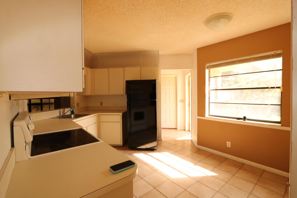 Photo of 4530 E Willow Pond Ct Court E, West Palm Beach, FL 33417 (MLS # B26015453)