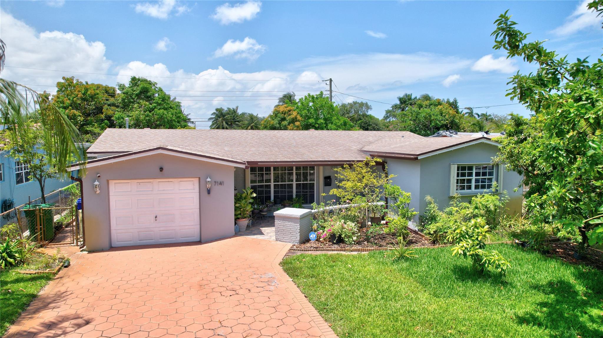 3-bedroom, 2-bathroom residence plus large permitted addition - making this one of the larger neighborhood properties. A popular and inviting floor plan with a living Room, Dining Room, Work area, Large kitchen with gas stove / oven (also gas water heater), laundry room, huge Family Room with extra room plus a rear enclosed porch, front entry porch and 1 car garage. Property also includes a stamped Concrete Driveway, Accordion shutters and a permitted gas powered home generator.
(1919). Property is nicely maintained with no HOA fees, updated kitchen and tile flooring plus roof replaced in 2020. See attachments for floor plkan.