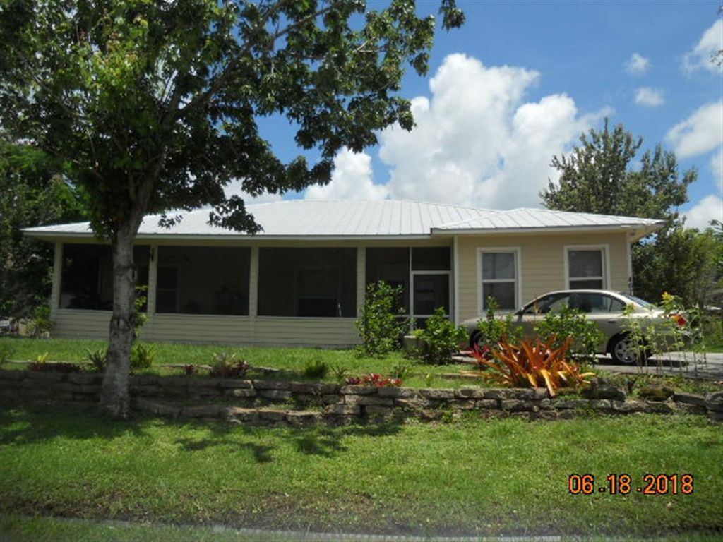 Photo of 467 SW Ryan Avenue, Port Saint Lucie, FL 34953 (MLS # R11018219)