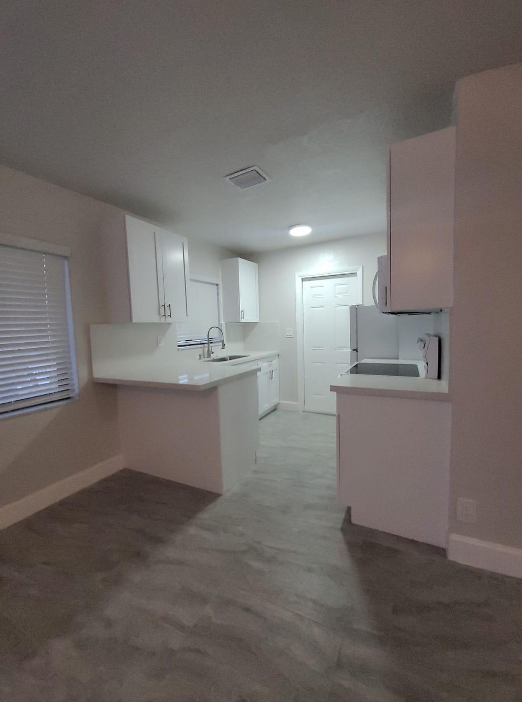 Photo of 1320 SW 34th Avenue #Unit 1, Fort Lauderdale, FL 33312 (MLS # B26009413)