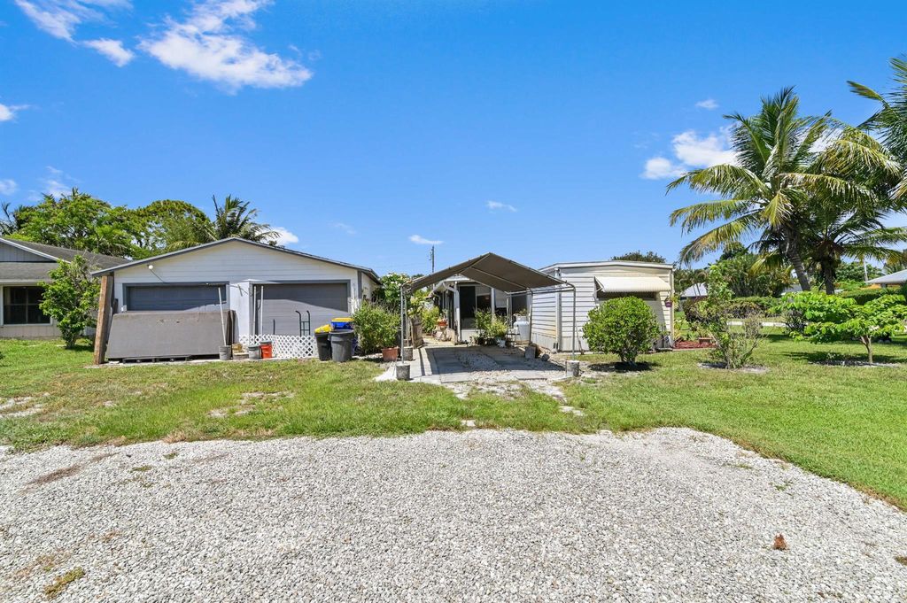 Photo of 5018 SE Isabelita Avenue, Stuart, FL 34997 (MLS # R11005082)