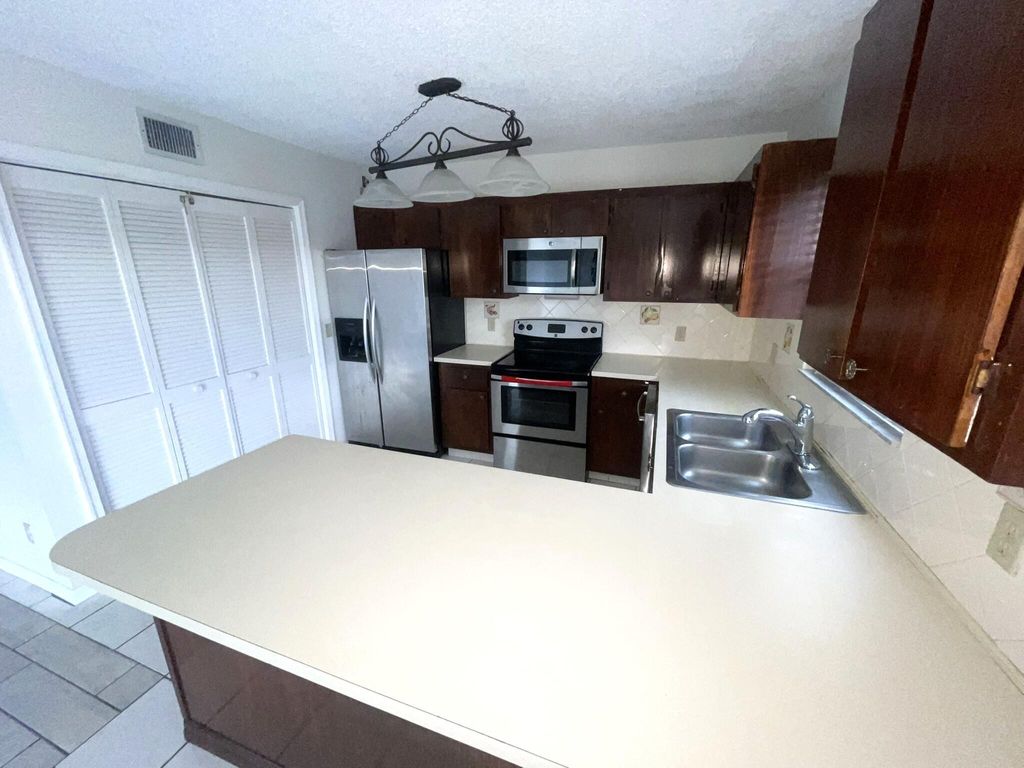 Photo of 5924 Longbow Lane #7, West Palm Beach, FL 33415 (MLS # B26008008)