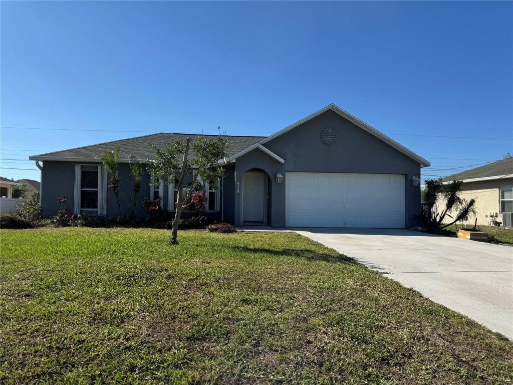 Photo of 458 SW Fields Avenue, Port Saint Lucie, FL 34953 (MLS # F10492118)