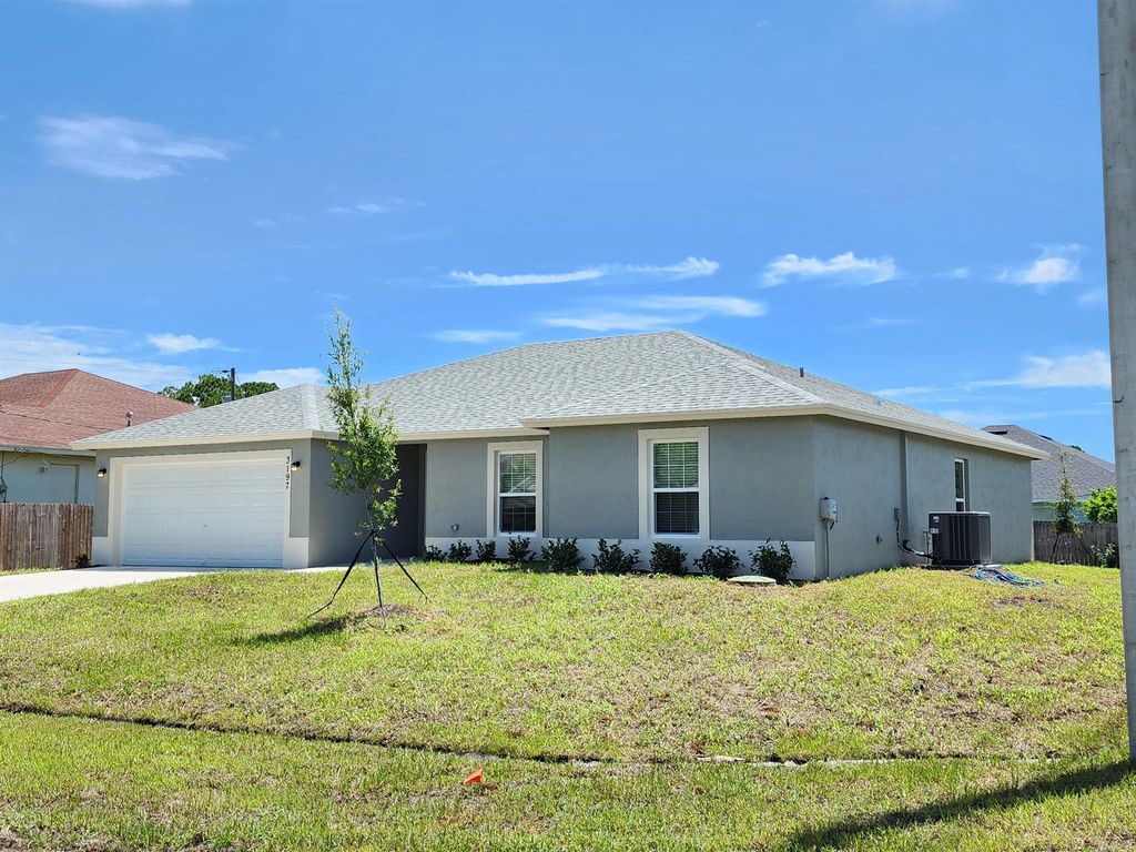 Photo of 3197 Armucher Street, Port Saint Lucie, FL 34953 (MLS # R11005075)