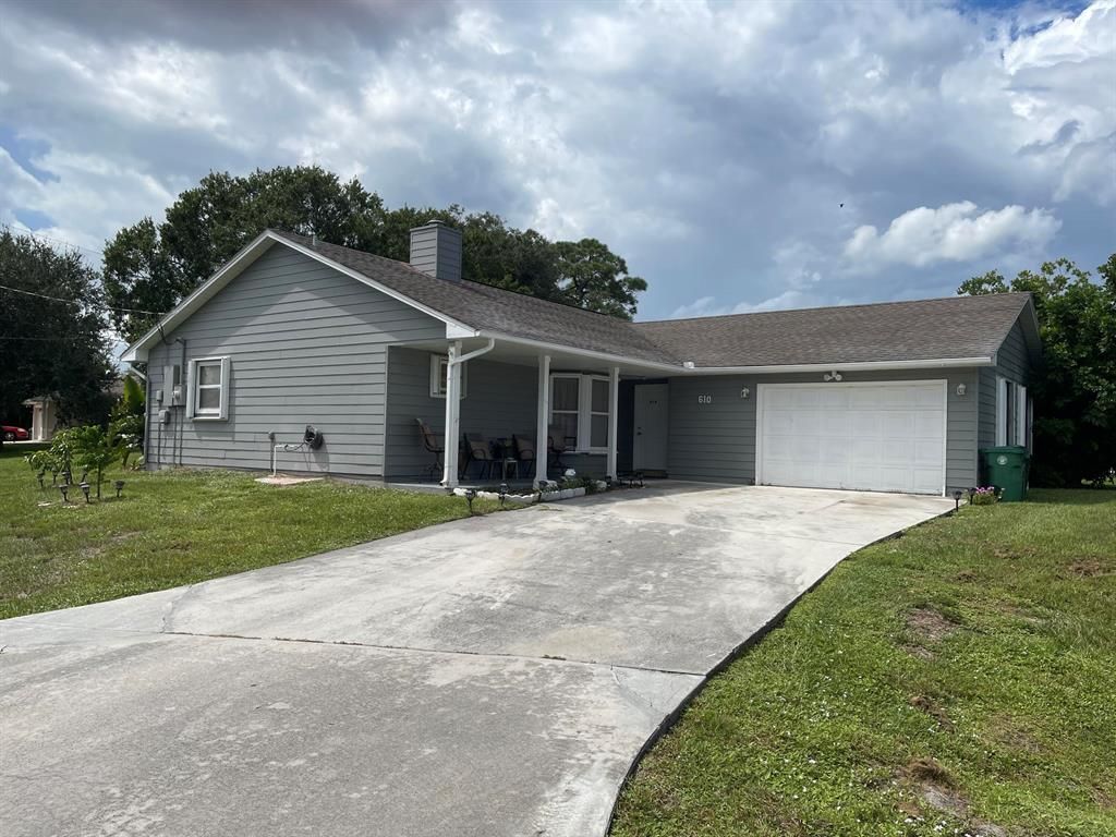 Photo of 610 NE Emerson Street, Port Saint Lucie, FL 34983 (MLS # R10746081)