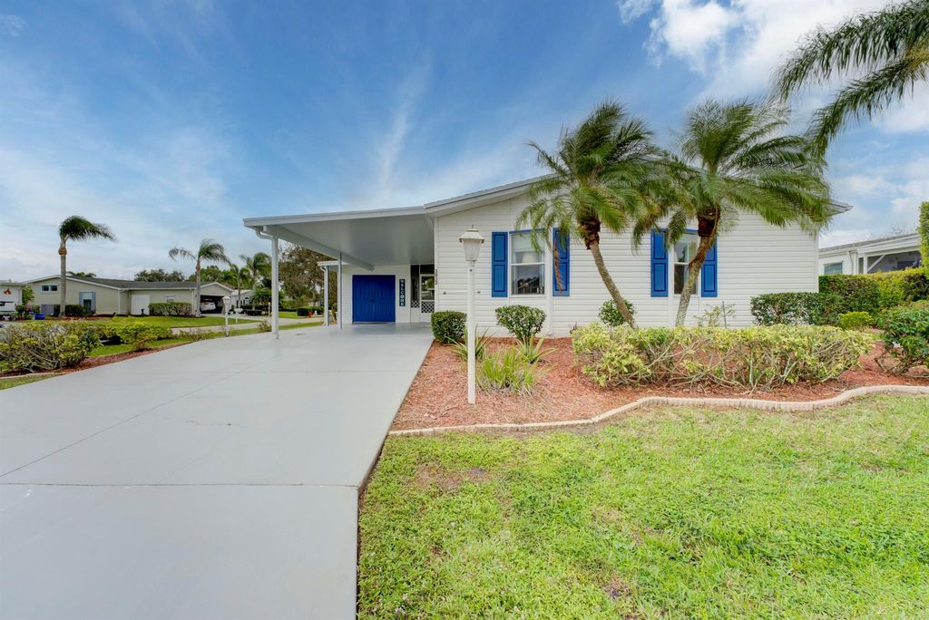 Photo of 3052 Five Iron Drive, Port Saint Lucie, FL 34952 (MLS # R10943800)