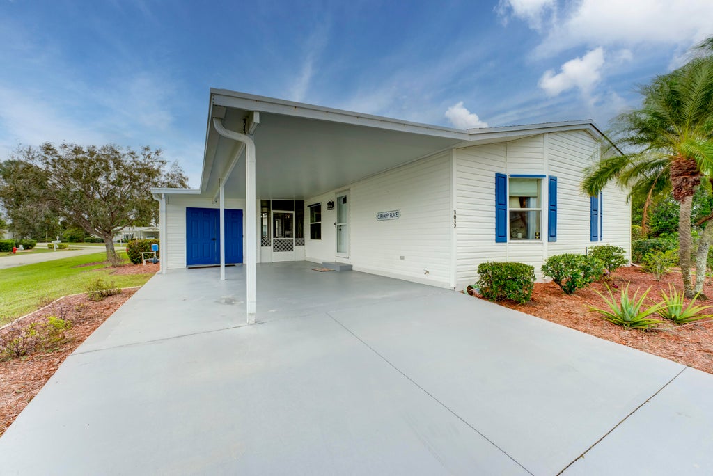 Photo of 3052 Five Iron Drive, Port Saint Lucie, FL 34952 (MLS # R10943800)
