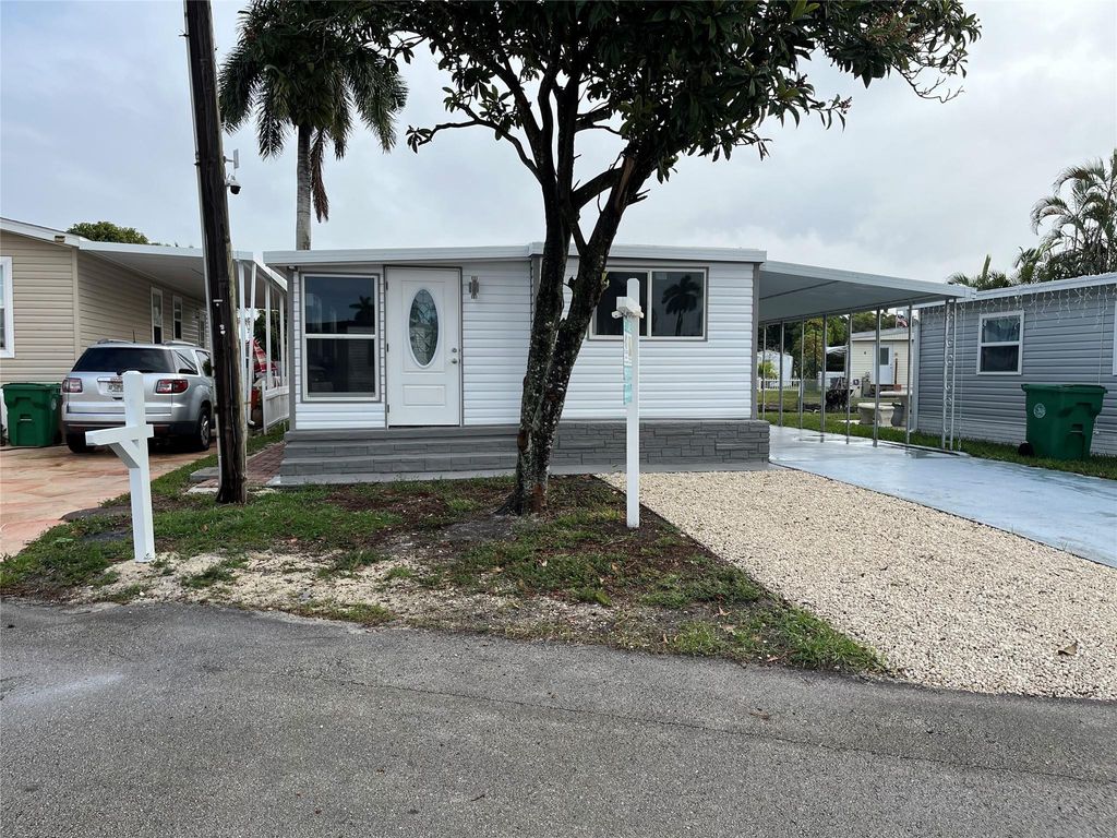 Photo of 1720 SW 85th Avenue, Davie, FL 33324 (MLS # F10550057)
