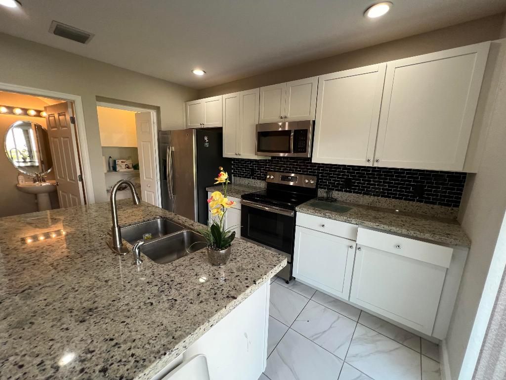 Photo of 2680 NW Treviso Circle, Port Saint Lucie, FL 34986 (MLS # R10932664)