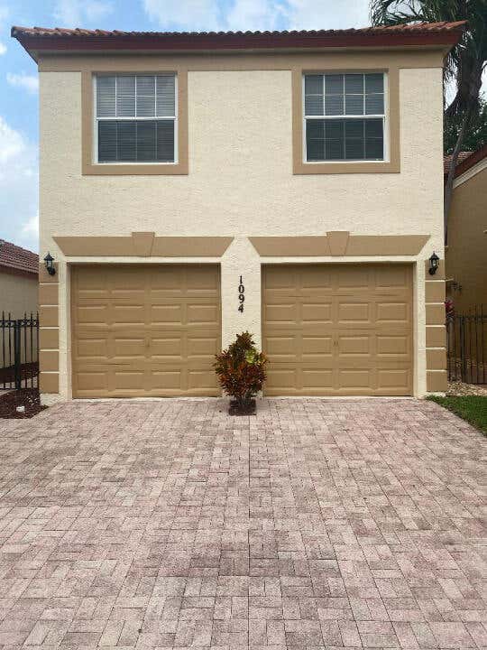 Photo of 1094 Via Jardin, Riviera Beach, FL 33418 (MLS # R10975437)