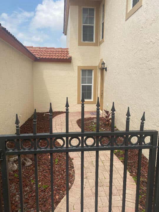 Photo of 1094 Via Jardin, Riviera Beach, FL 33418 (MLS # R10975437)