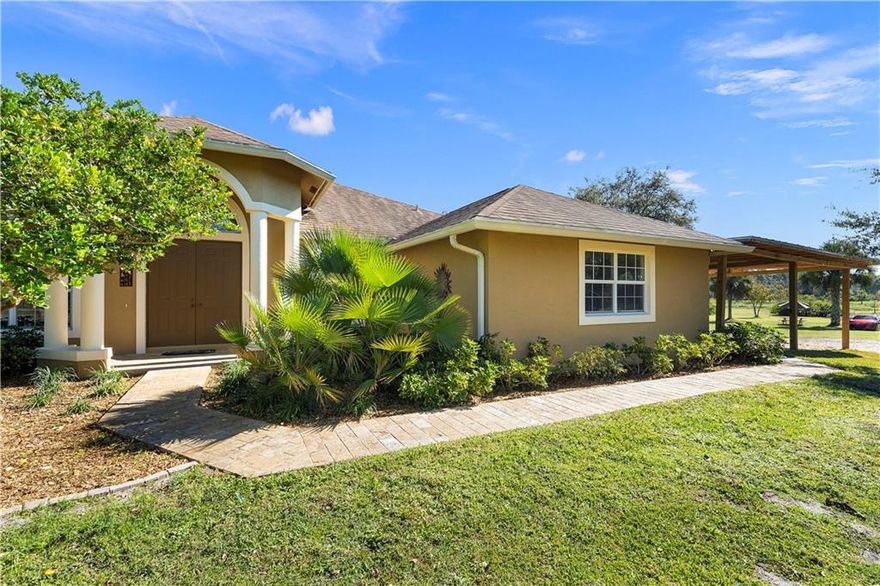 WELCOME TO LUXURY LIVING! ENJOY PRIVACY AND SERENITY IN THIS BEAUTIFUL 4/3/2 POOL HOME ON 10.1 +/-ACRES, INCLUDES PICTURESQUE 6 ACRE PRESERVE AREA, ADORNED WITH A VARIETY OF MATURE TREES! CONCRETE BLOCK CONSTRUCTION, VAULTED AND TRAY CEILINGS THROUGHTOUT, OPEN KITCHEN OFFERS GRANITE AND STAINLESS-STEEL APPLIANCE PACKAGE. MASTER BEDROOM WITH DUAL WALK-IN CLOSETS, DUAL SINKS, EXPANSIVE MASTER SHOWER AND SOAKING TUB. OUTSIDE FEATURES BEAUTIFUL CABANA OVERLOOKING CUSTOM POOL PERFECT FOR ENTERTAINING. MULTIPLE COVERED STORAGE BUILDINGS WITH AN ENCLOSED WORKSHOP. ACREAGE IS FENCED AND GATED. EASY ACCESS TO I-95 AND THE FLORIDA TURNPIKE. SHORT DRIVE TO ALL MAJOR SHOPPING, PALM CITY, STUART, OKEECHOBEE AND INDIANTOWN. ONE-OF-A-KIND LOCATION AND NEIGHBORHOOD!