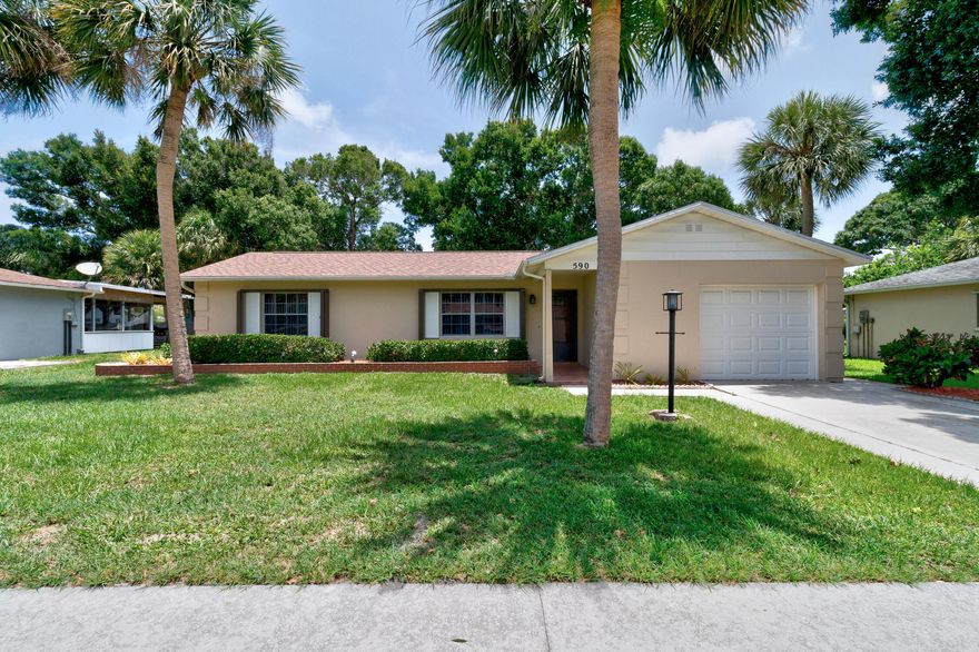 What a find: come check out this terrific home w/ 2BR/2BA + den, Florida room & POOL in much desired Laurelwood!  You can really see the pride of ownership here: new paint and carpet; roof new in 2024; electric panel new in 2017; the pool has been resurfaced, is heated and screened-in; and there are easy-to-use accordion shutters for the whole house. The 2 bedrooms each have very large wall closets, along with 2 linen closets; there is a nice den/office right off the kitchen with direct access to the pool; plus there is a huge Florida room which adds so much to the living space of this home! Tax records show a 3 bedroom, but it is really a 2 bedroom w/den