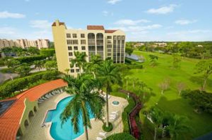 Panoramic lake and golf views from this stunning 3500 liv sqft unit in the gated complex of Boca Pointe. Architectural arches, clean lines, custom coffered ceiling design and moldings, and designer lighting features. IMPACT Windows thru-out!  Magnificent updated kitchen with 9 foot chefs island, Franke farmers sink, LG Fridge, Thermador stove, wall oven, glass cabinets. Oversized wood foyer with marble inlay.  Master suite offers 2 custom closets, dual floating sinks, Toto toilet, sculptured walls and distressed glass shower enclosure.  All 3 baths are superbly updated with custom materials.   Storage space galore with oversized laundry room, whirlpool duet front load, laundry sink, cabinetry. Private elevator foyer for this unit also offers additional storage area.